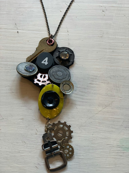 Necklace- “All 4 Bits” Buttons, buckle, keys, coins & gears on a felted back $24